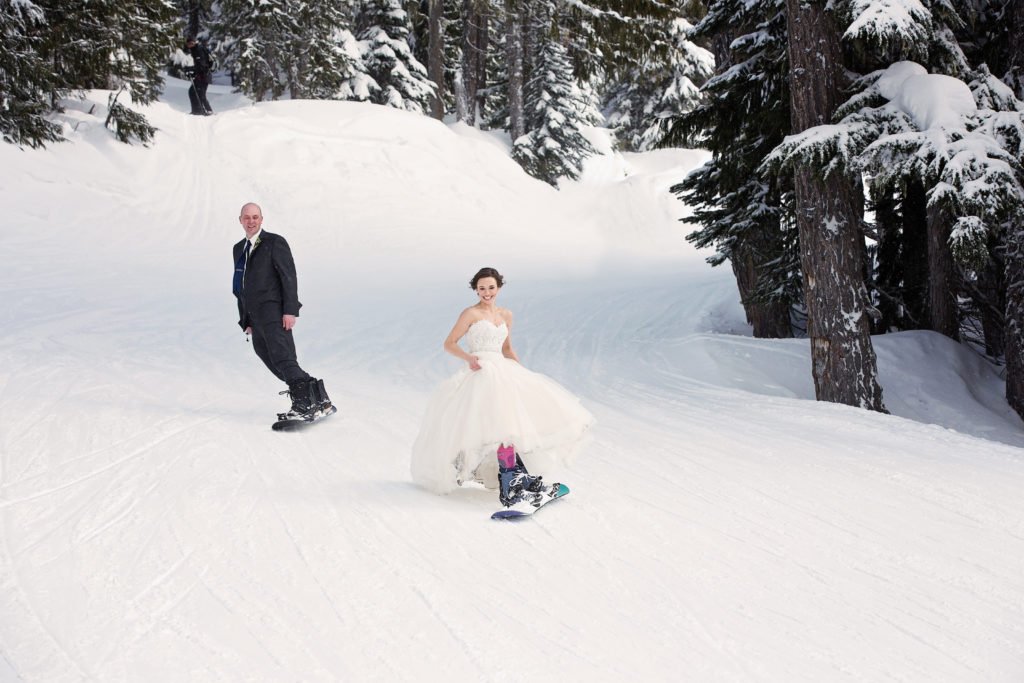 Whistler Elopements Bride and Groom snowboarding on Mountain - The Whistler Elopement Company
